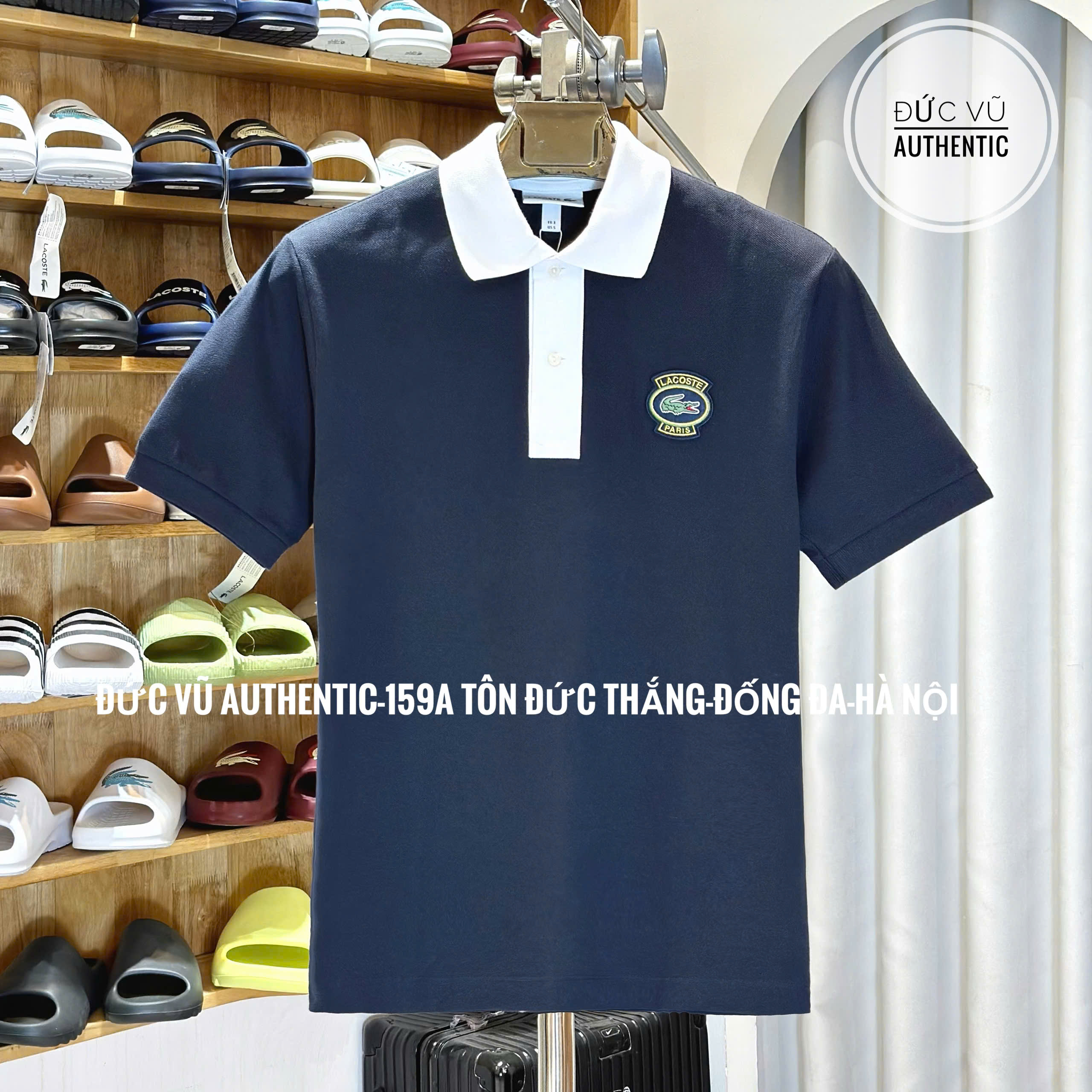 Áo polo nam Lacoste navy cổ trắng – logo thêu badge thể thao