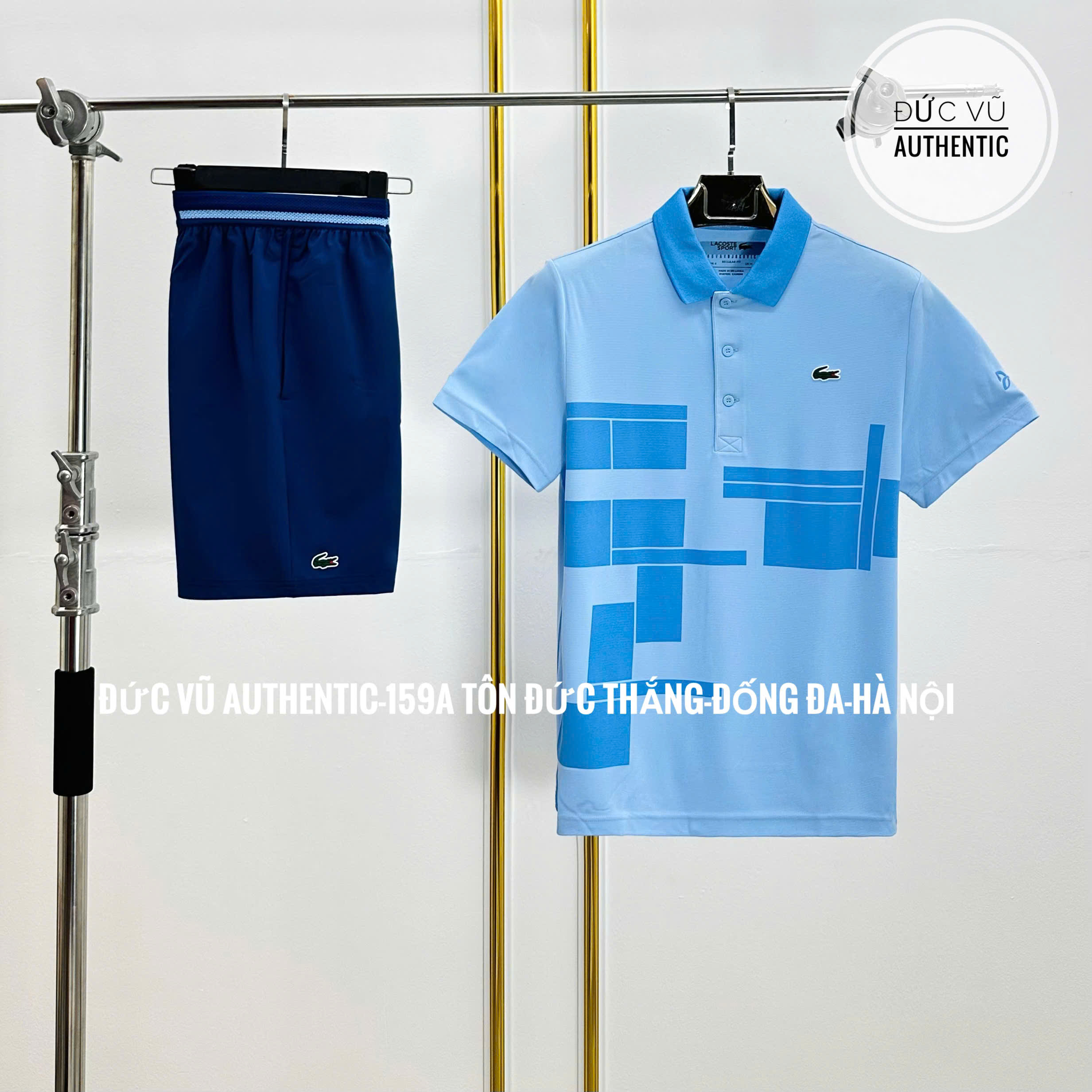 Bộ thể thao nam Lacoste xanh baby – họa tiết khối hình học hiện đại