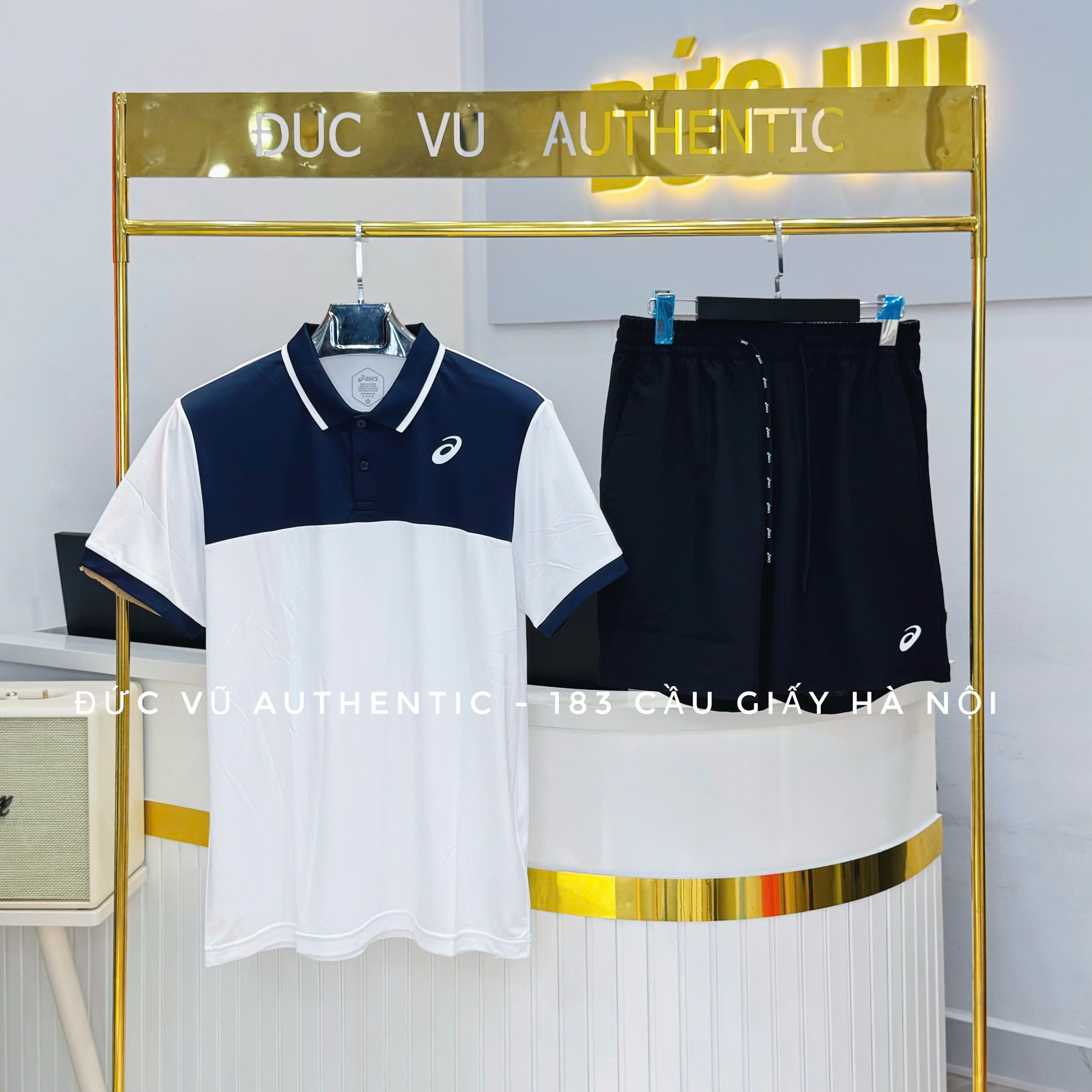 Bộ thể thao nam Asics polo trắng phối xanh navy