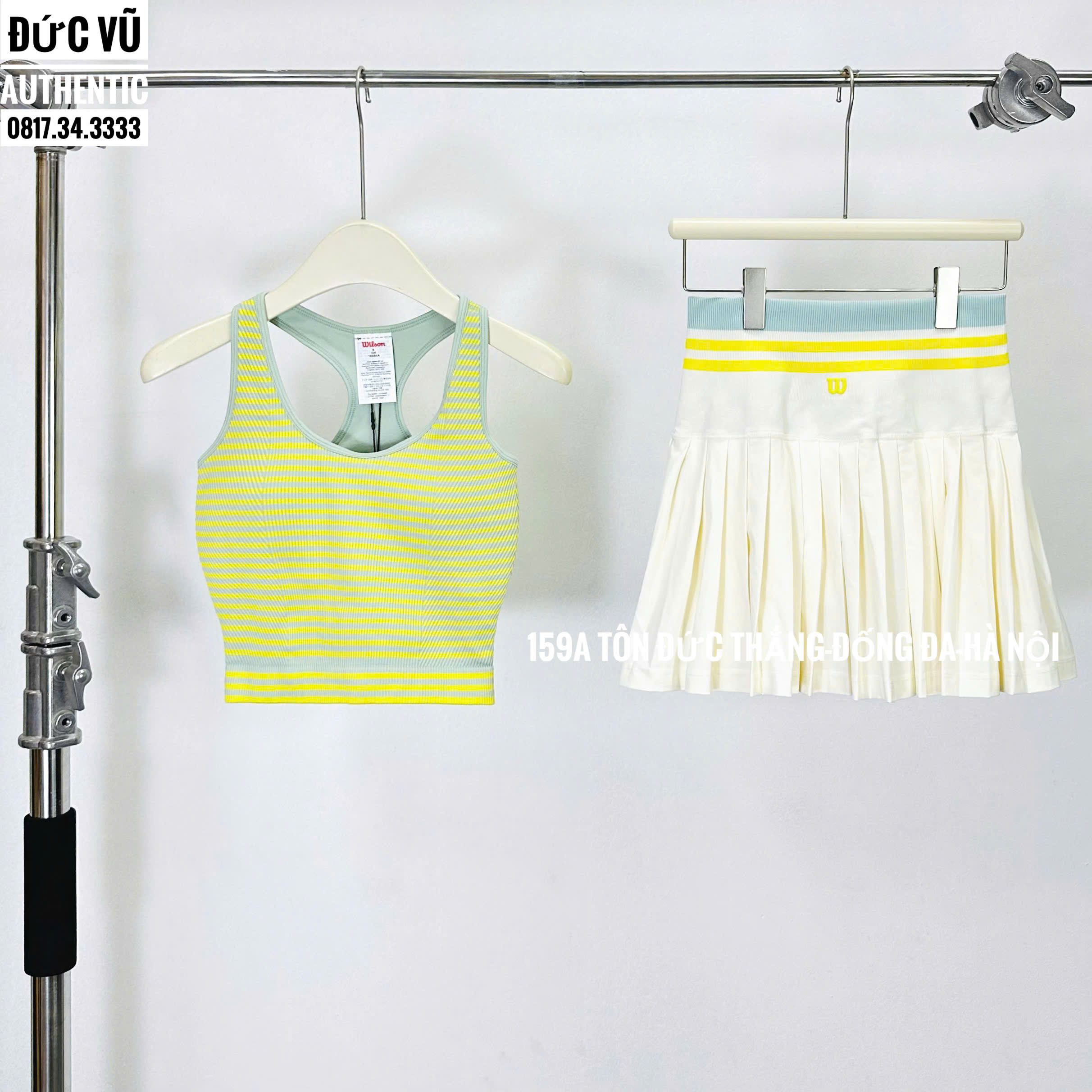 Set tennis nữ sọc vàng pastel & chân váy trắng viền vàng Wilson