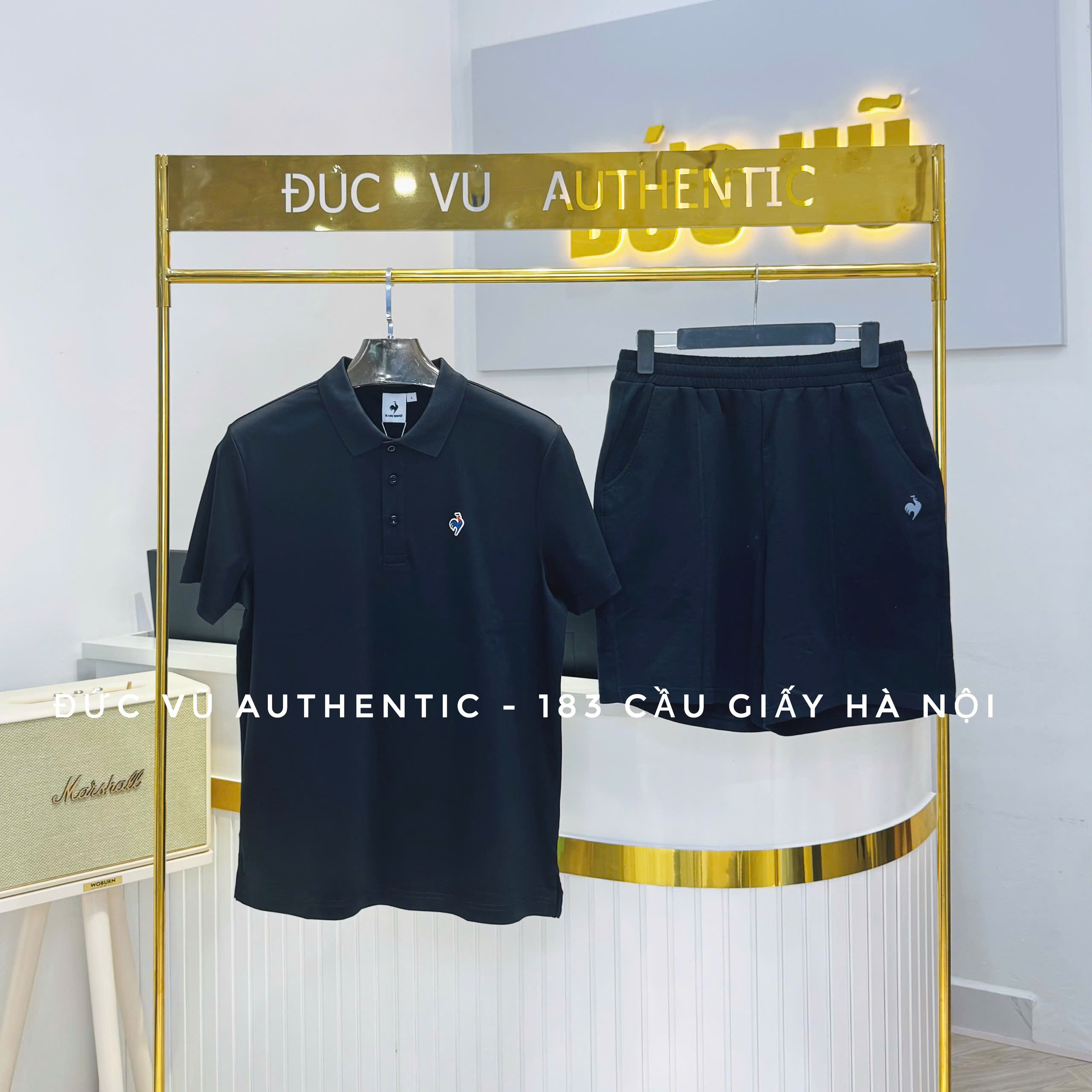 Set đồ nam Le Coq Sportif – Áo polo đen & quần short thể thao đen basic