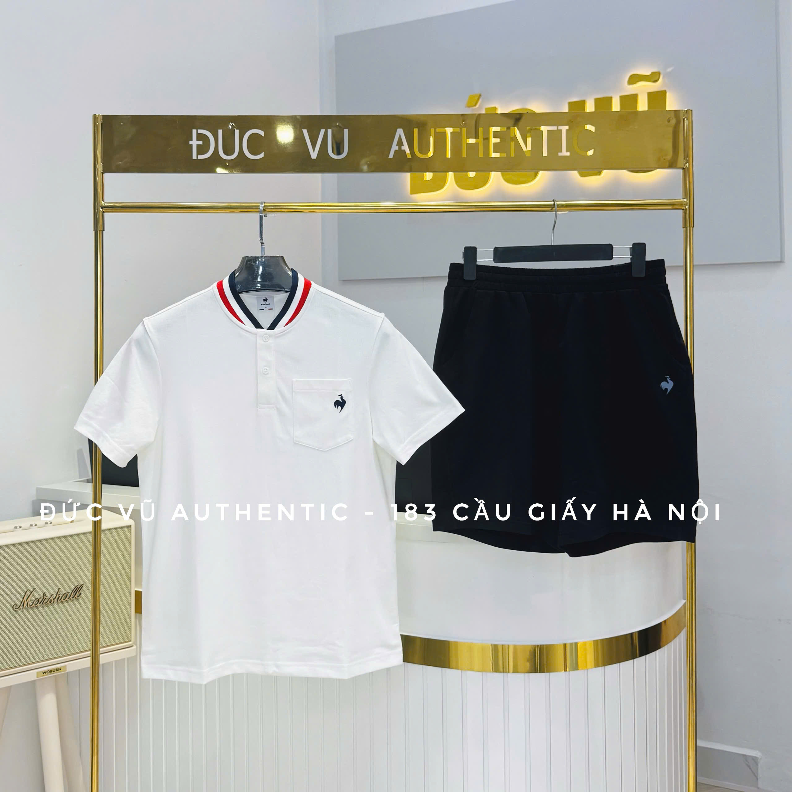 Bộ đồ thể thao nam Le Coq Sportif cổ bo phối sọc – trắng đen