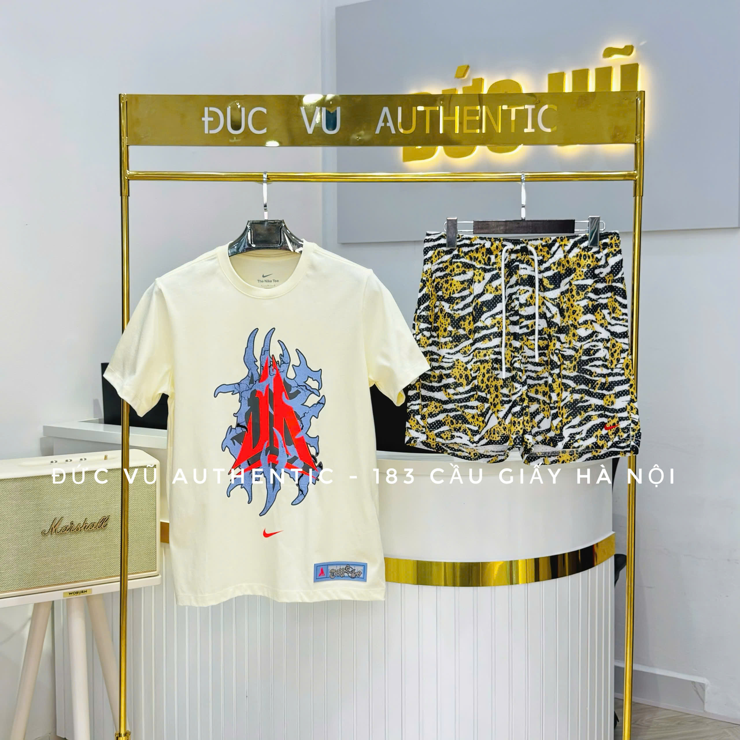 Set Nike Air Jordan x DNA Animal – Áo thun họa tiết Paris đỏ & Quần short da báo phá cách