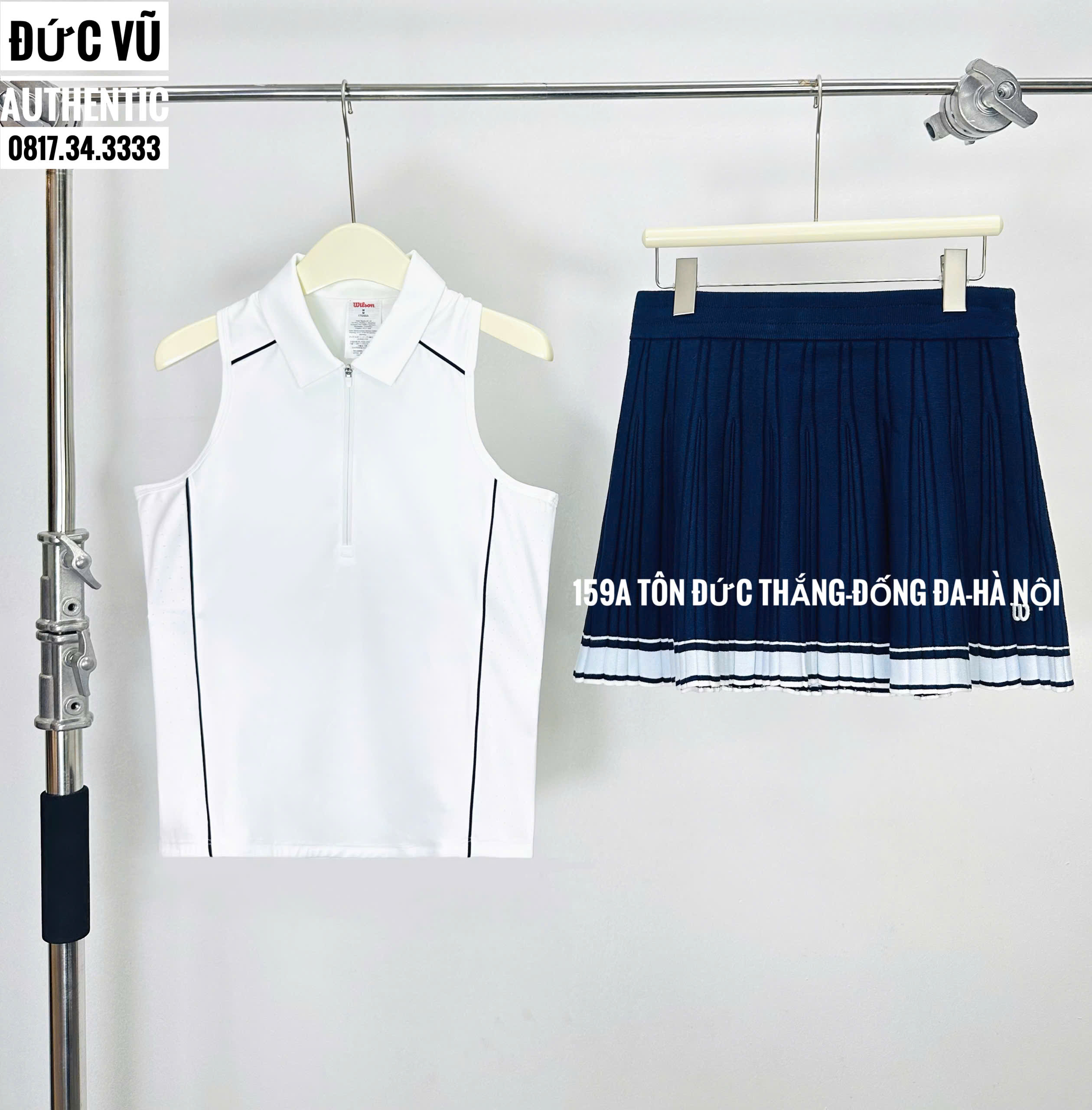 Set thể thao nữ Wilson áo không tay trắng & chân váy xếp ly navy