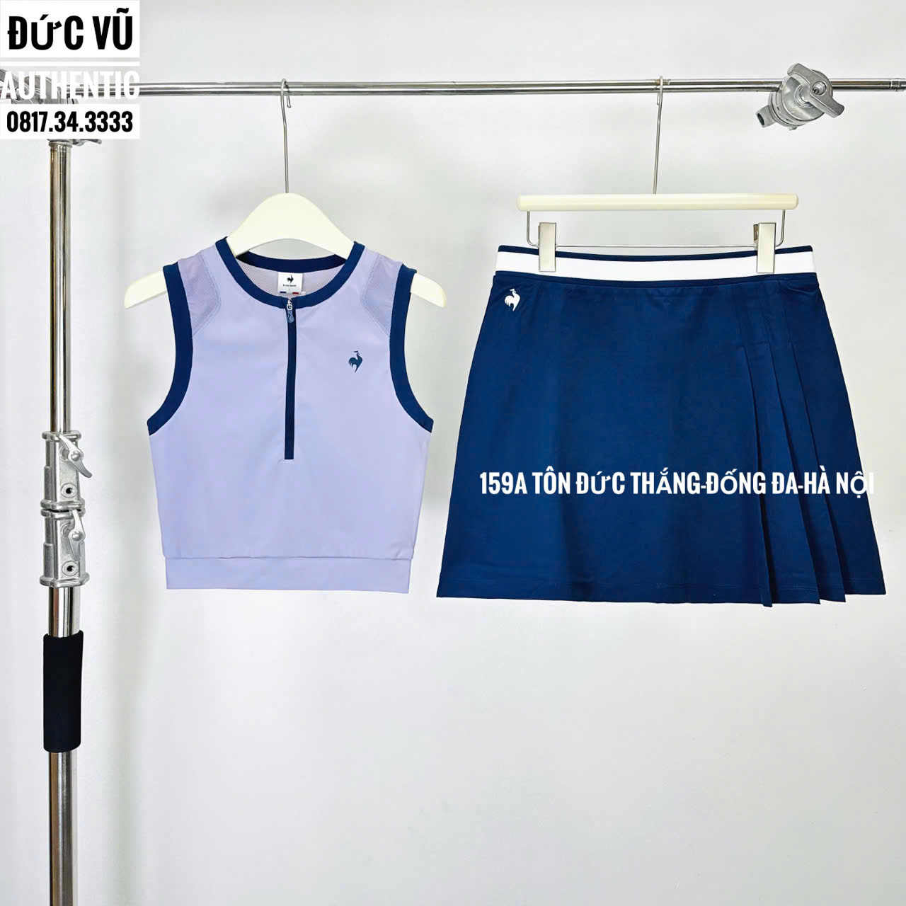 Set Le Coq Sportif Tennis – Áo Croptop Tím & Váy Xanh Navy Năng Động
