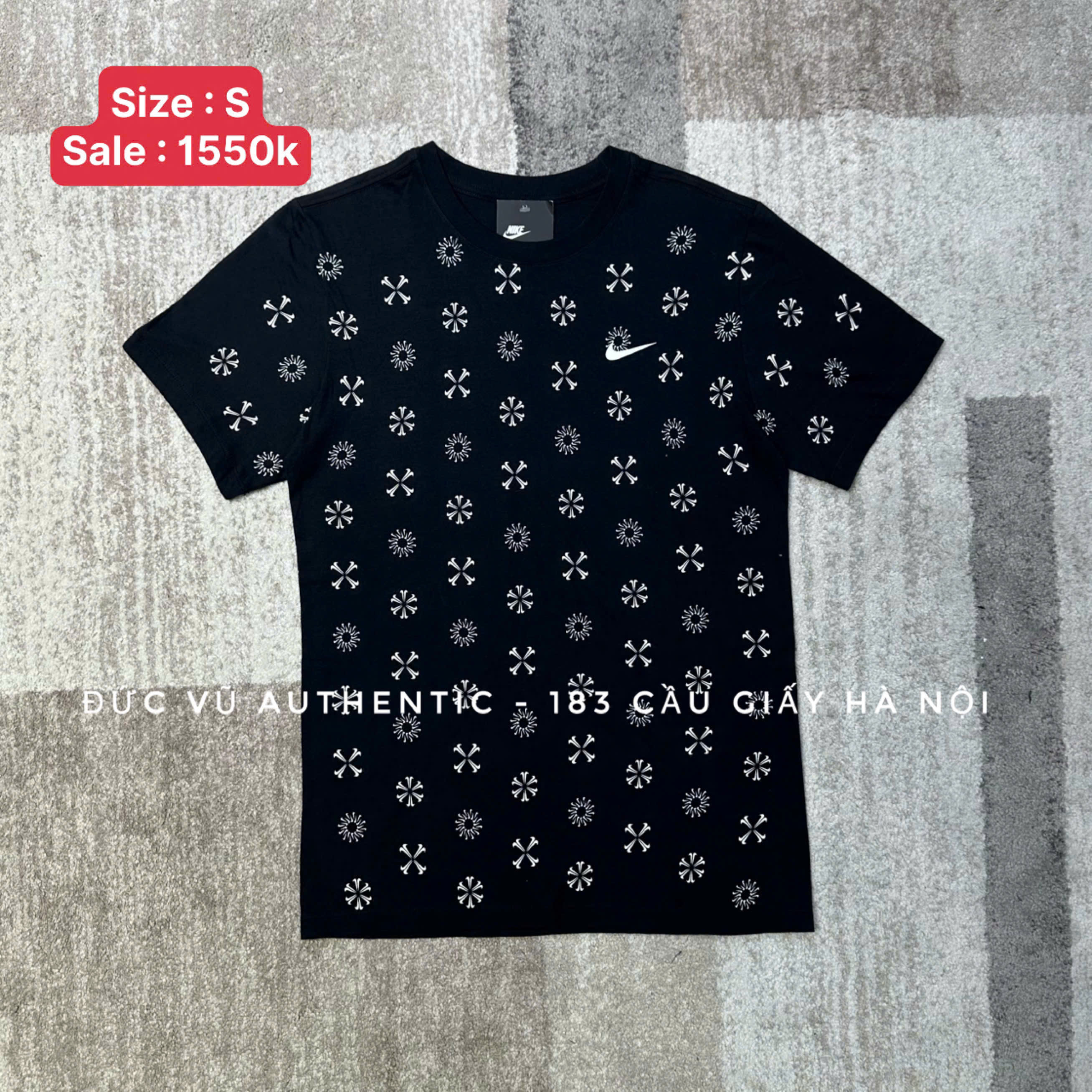 Áo thun Nike Repeat Pattern Graphic Tee – Đen họa tiết trắng