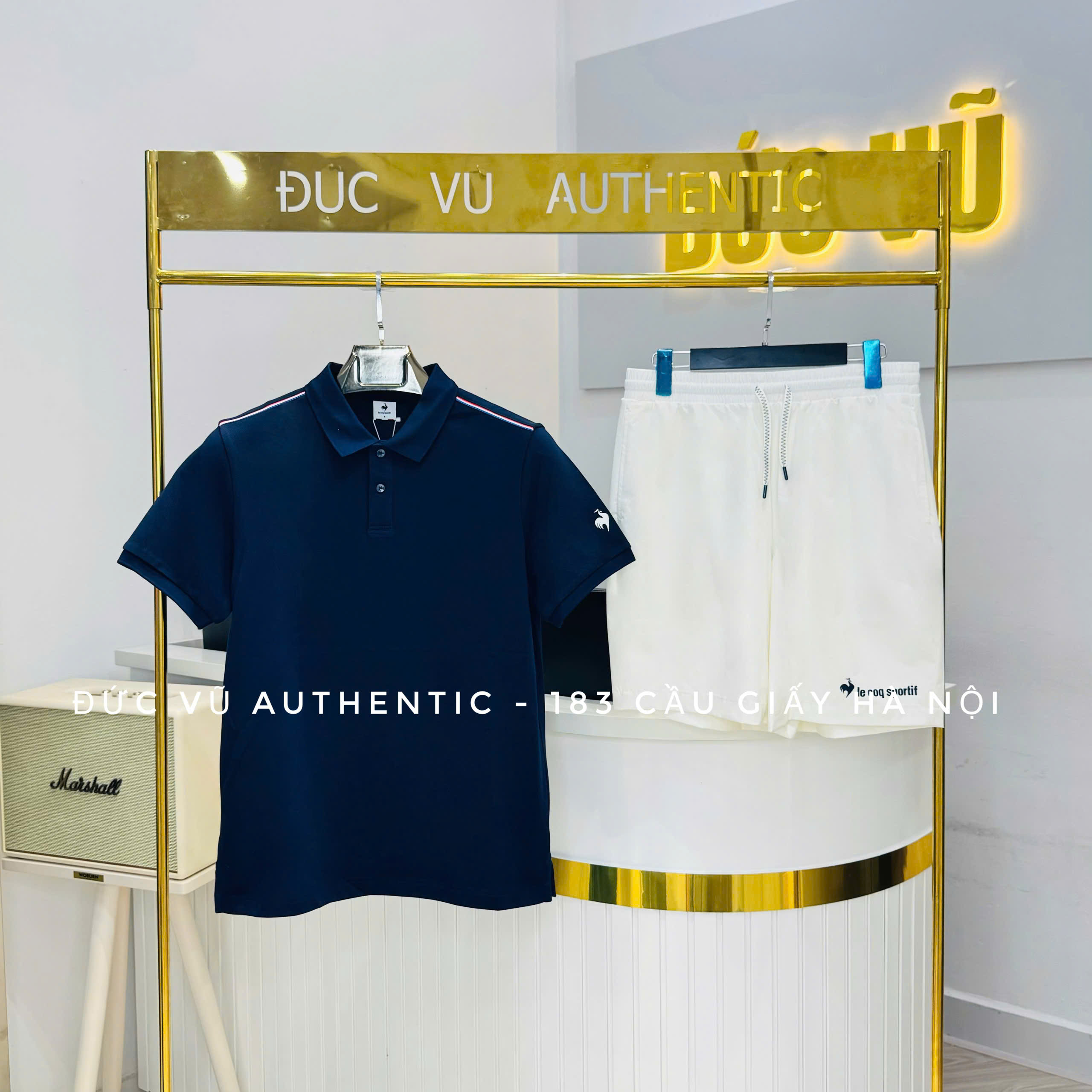 Set đồ thể thao nam Le Coq Sportif – Polo navy & short trắng logo thêu