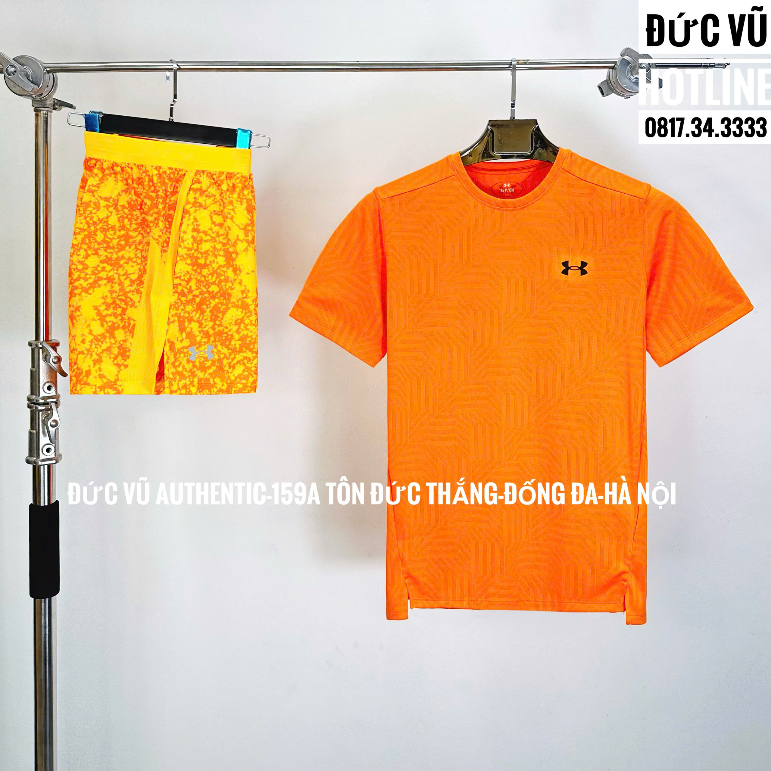 Set Under Armour Năng Động – Áo cam họa tiết & quần splash vàng chanh
