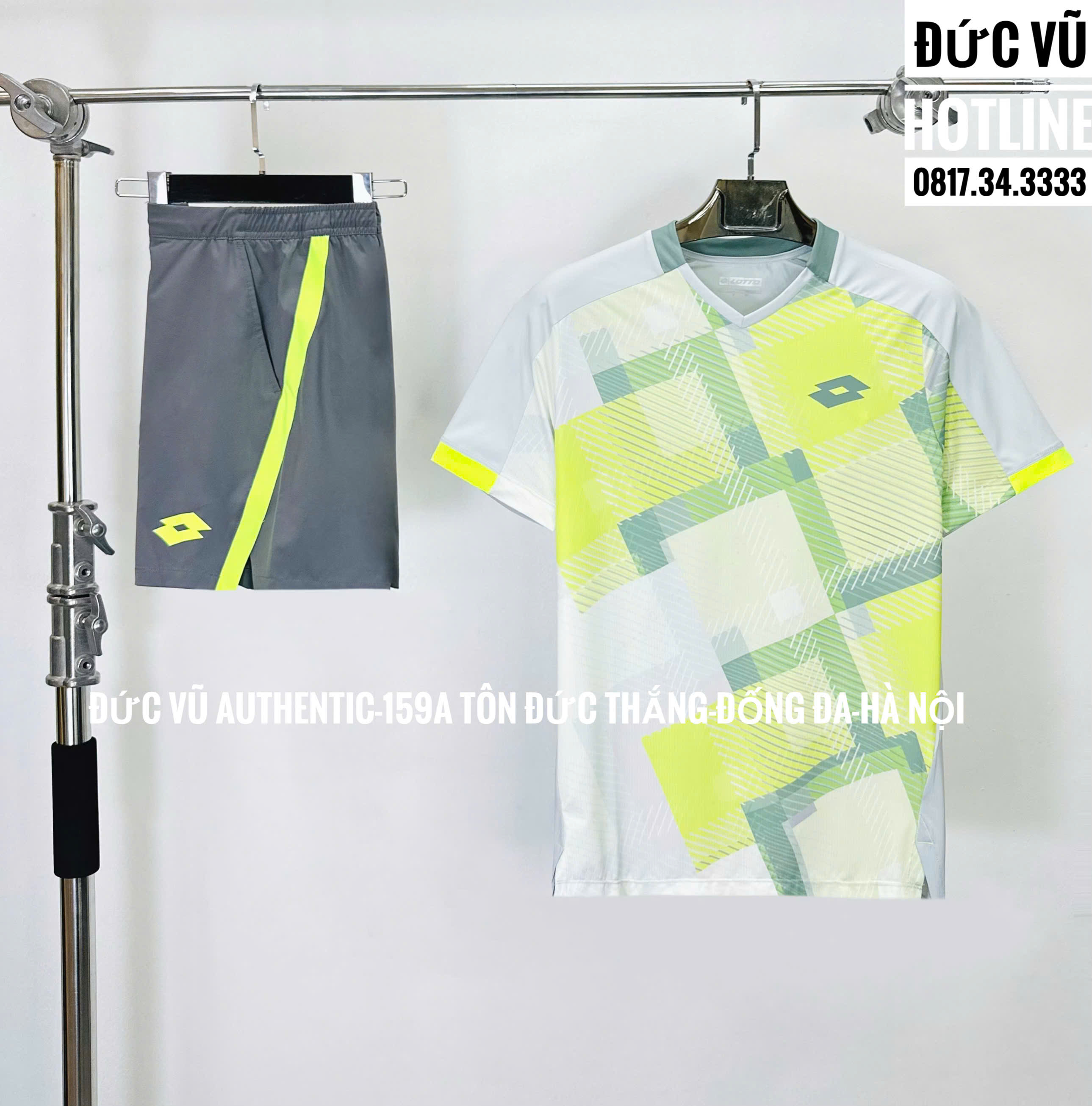 Set đồ thể thao nam Lotto Graphic Line – Trắng ghi phối vàng neon
