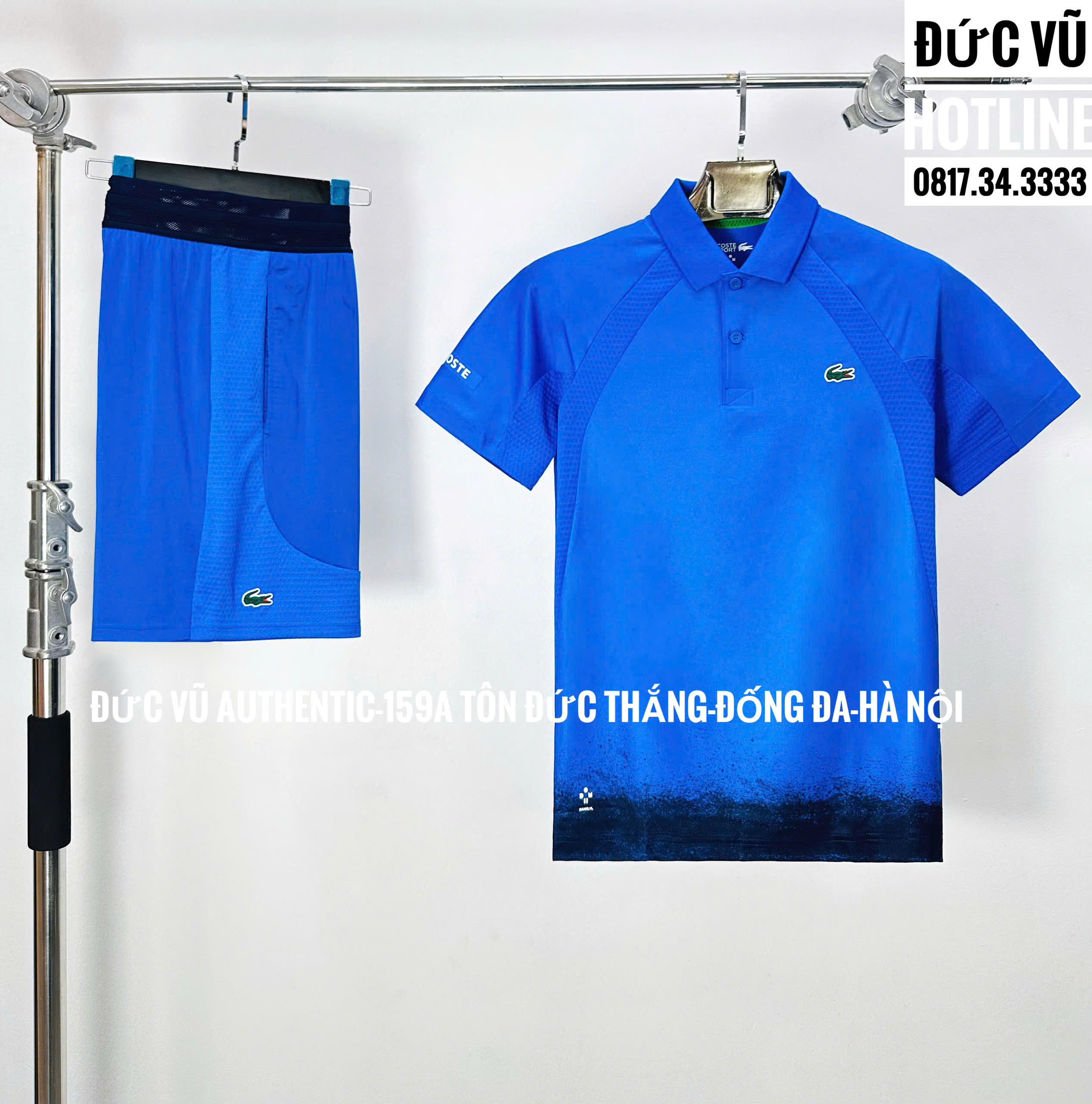 Set thể thao nam Lacoste xanh dương navy chuyển sắc
