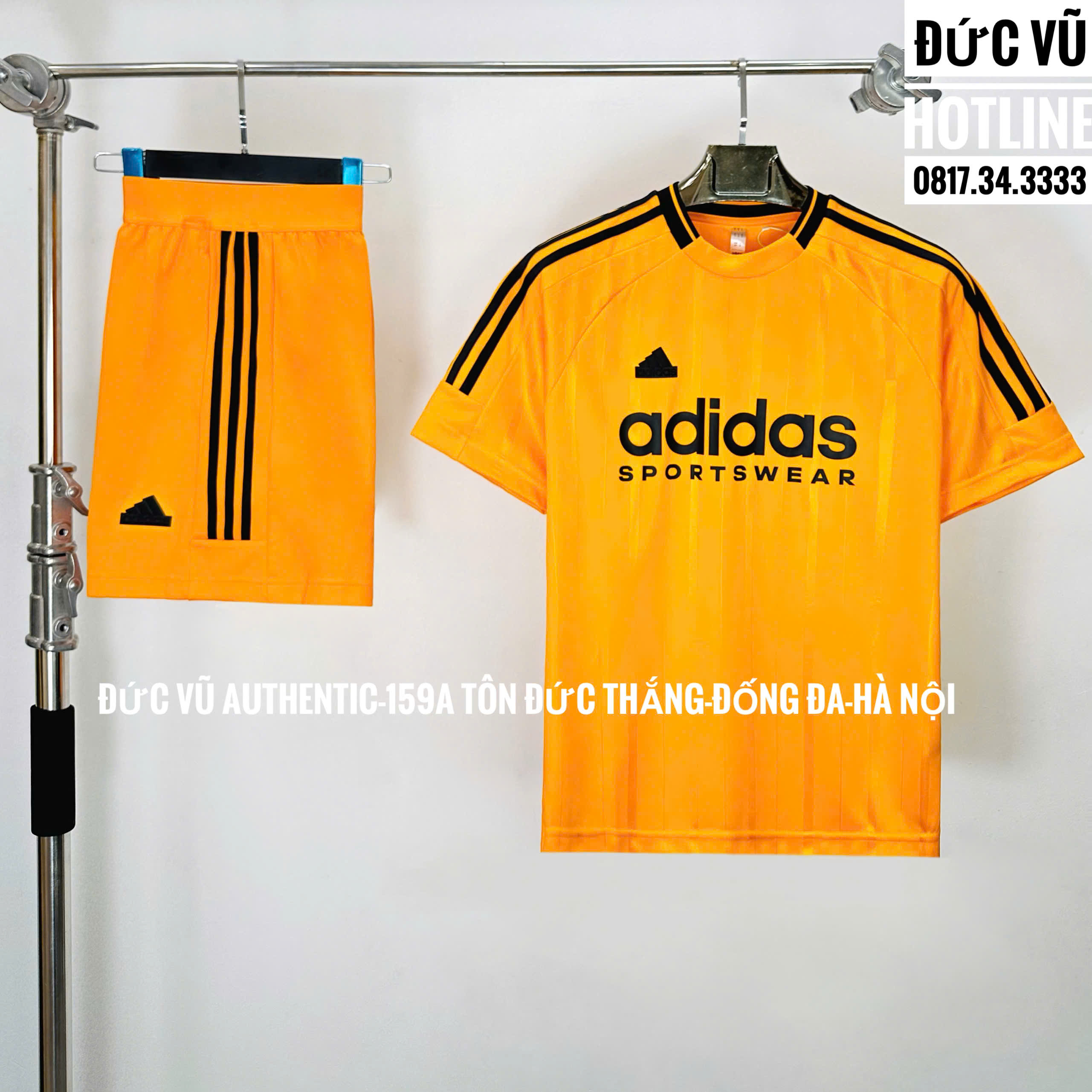Set thể thao Adidas Sportswear cam sọc đen
