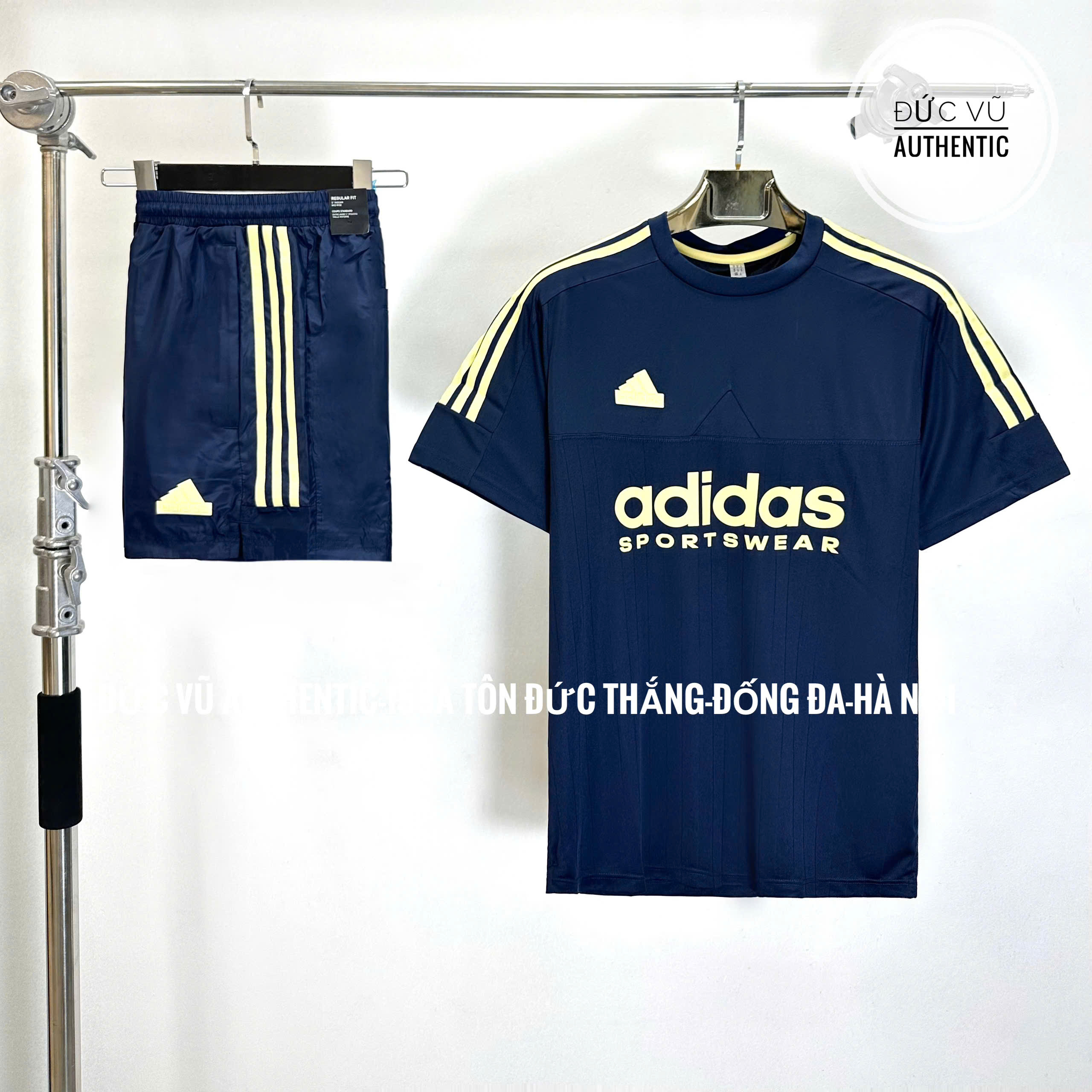 Set thể thao Adidas Sportswear xanh navy sọc kem