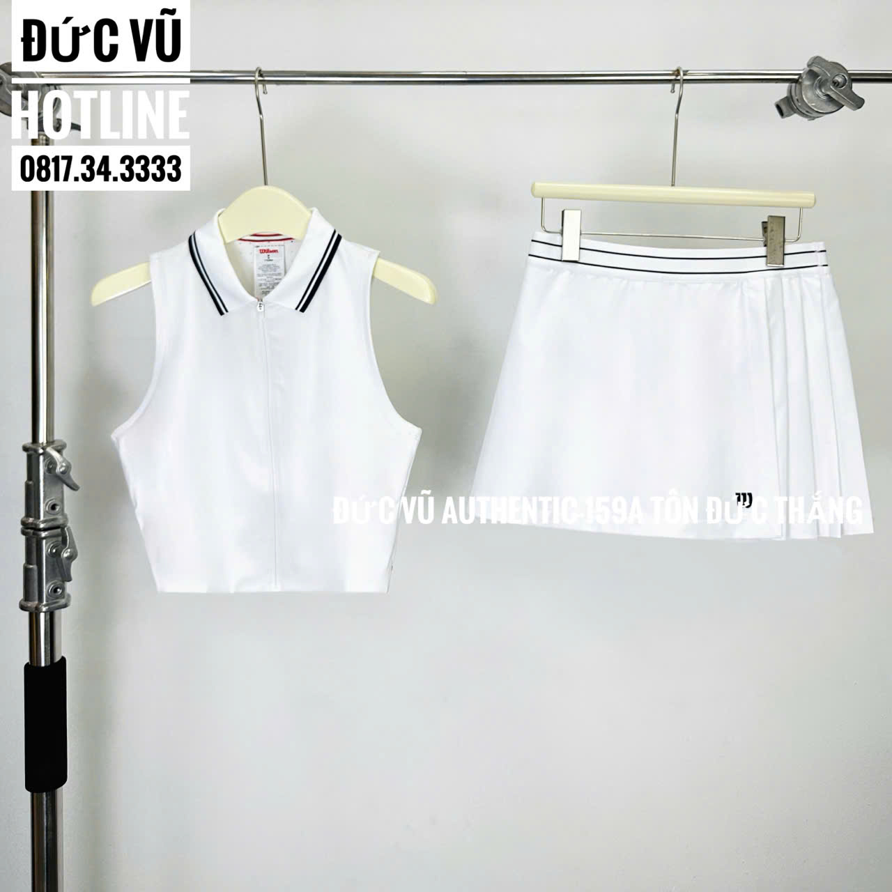 Set thể thao nữ Wilson trắng cổ bẻ không tay & chân váy xếp ly