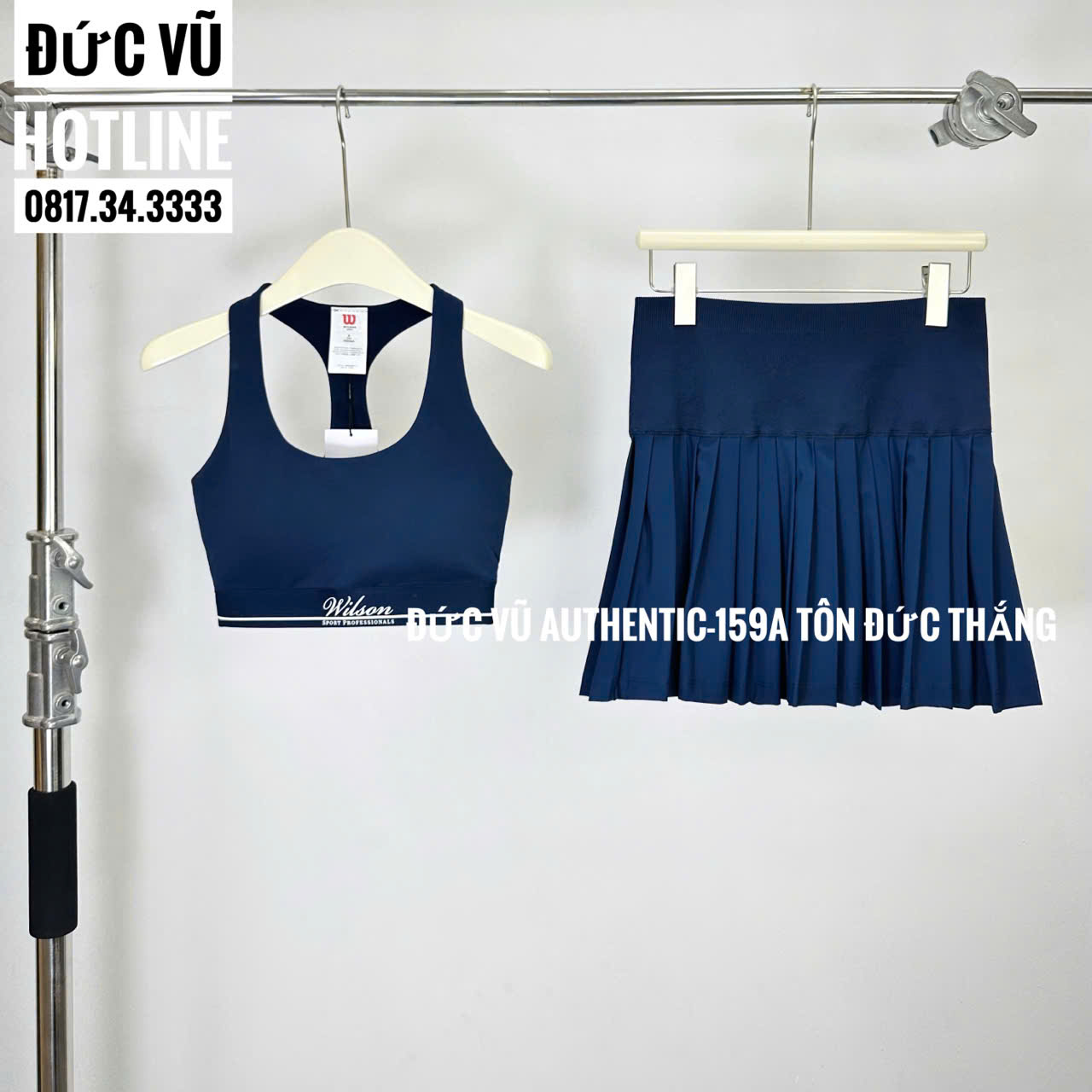 Set thể thao nữ Wilson navy: bra thể thao & váy xếp ly