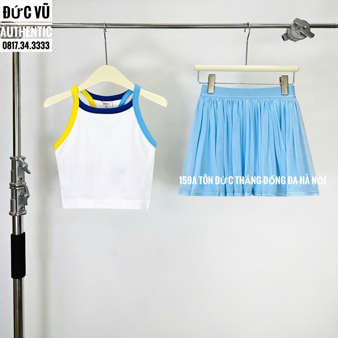 Set thể thao nữ croptop viền màu phối váy xếp ly xanh baby