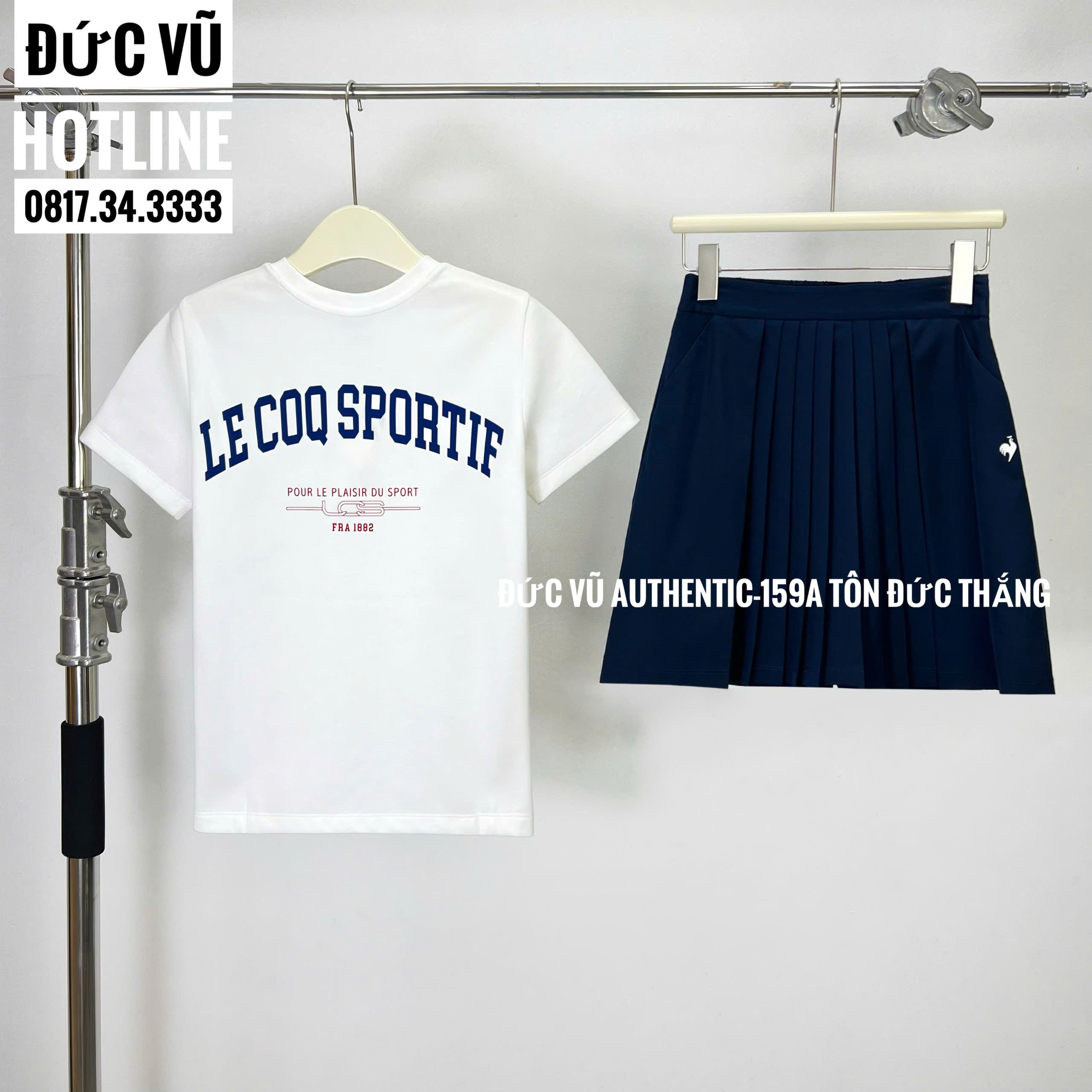Set thể thao nữ Le Coq Sportif – Áo thun trắng + Chân váy tennis xanh navy