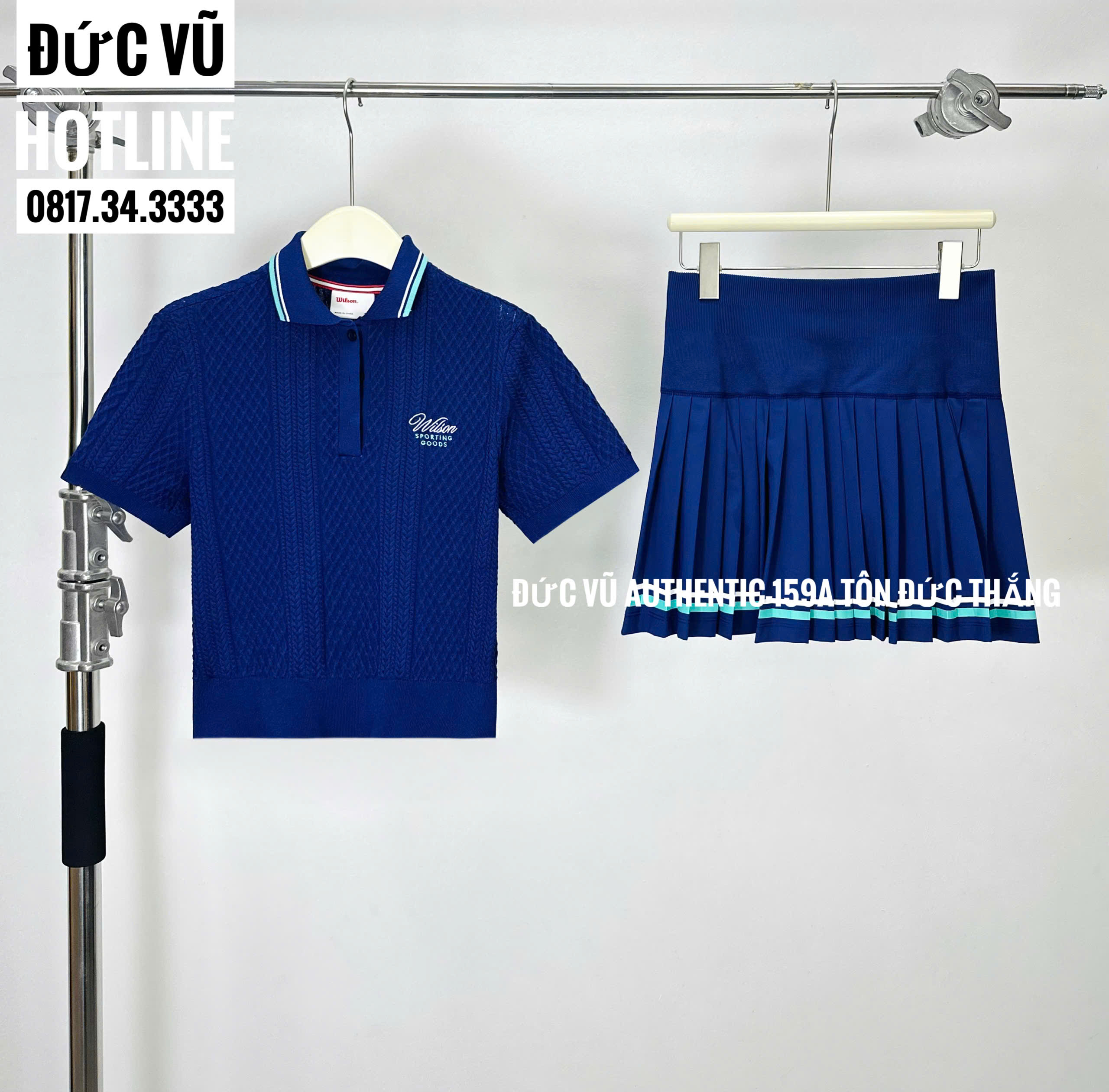 Set thể thao nữ polo xanh navy phối chân váy xếp ly