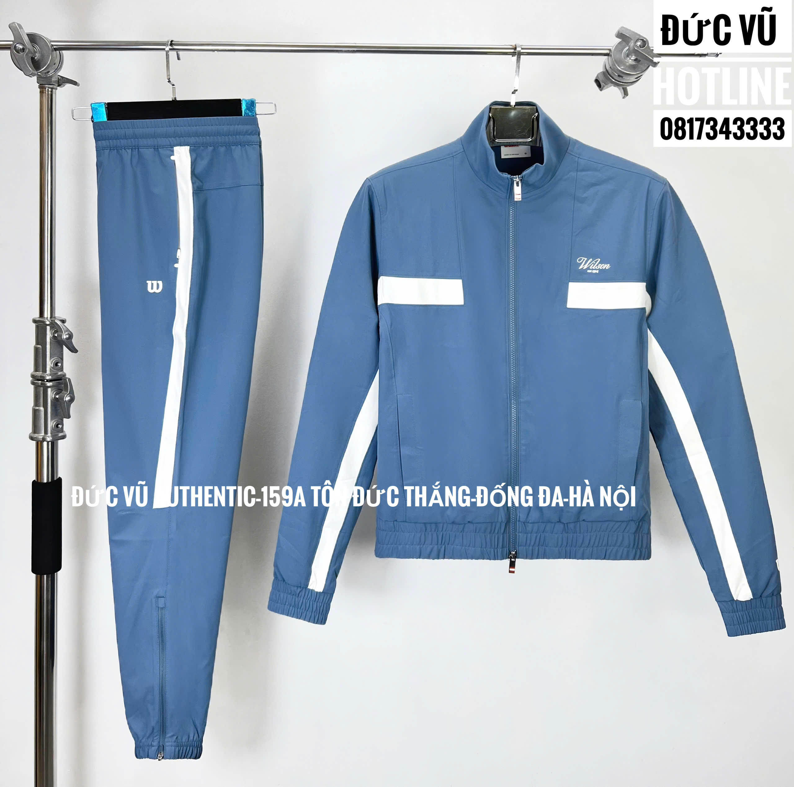 Bộ quần áo thể thao Wilson xanh viền trắng