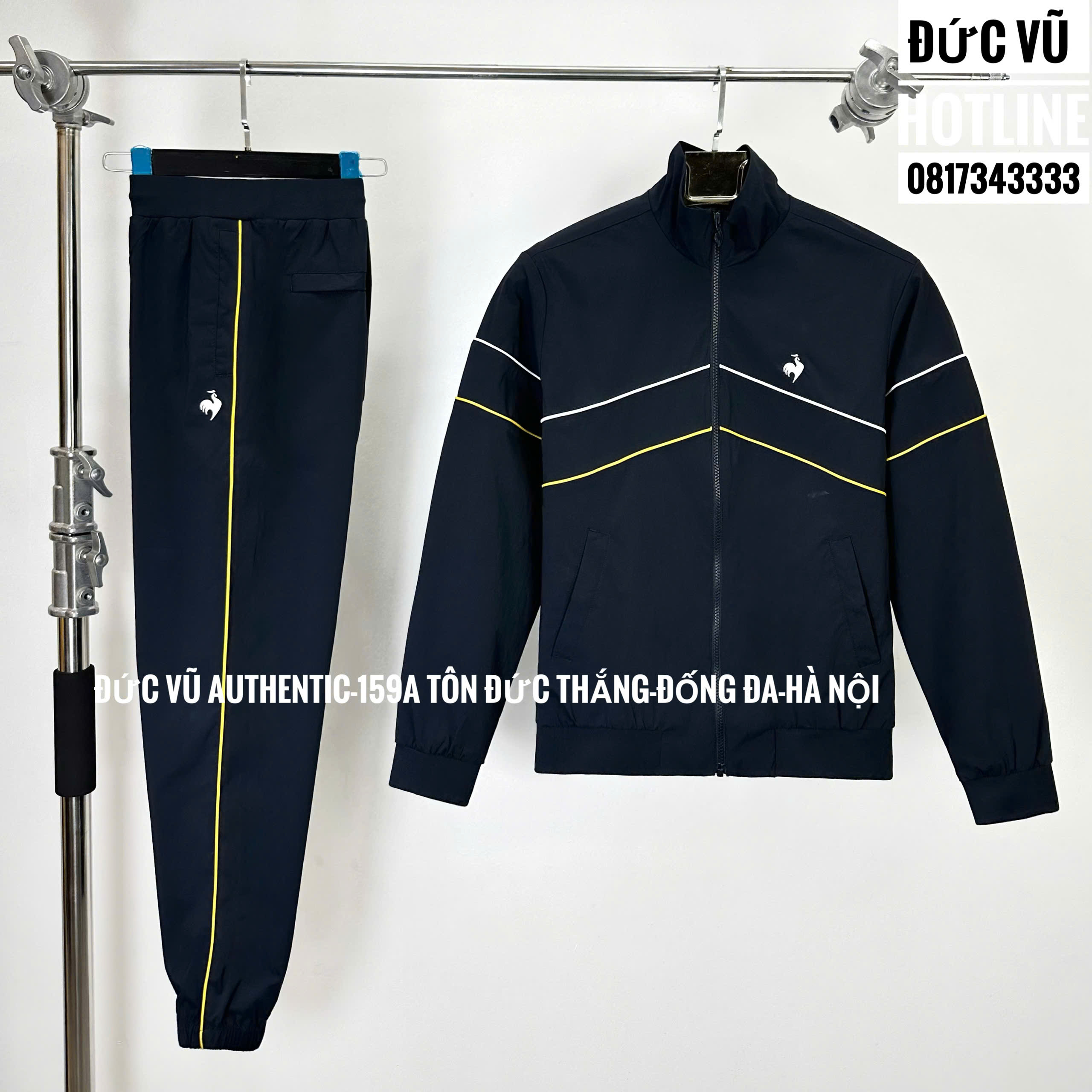 Bộ gió Le Coq Sportif navy phối line trắng vàng