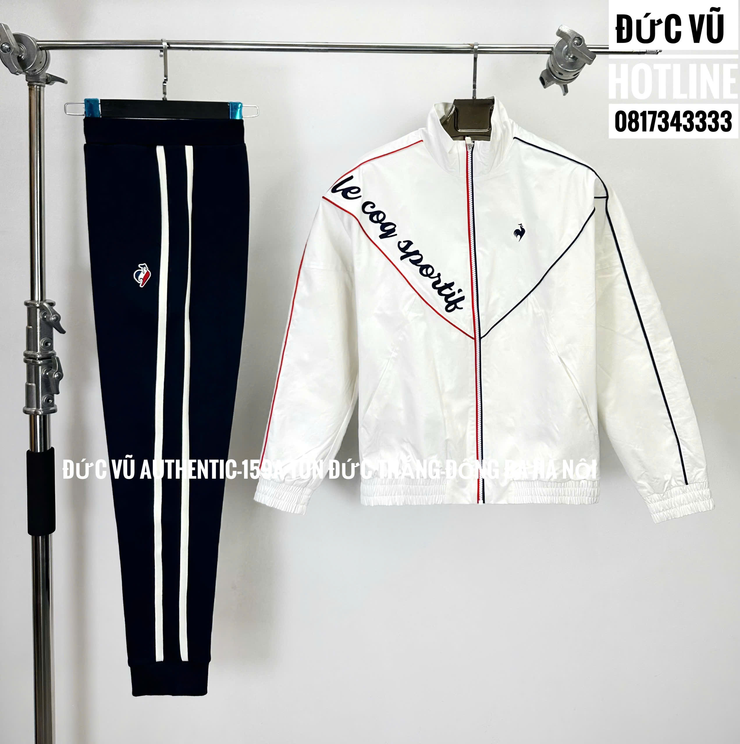 Bộ gió Le Coq Sportif trắng phối xanh navy – đỏ