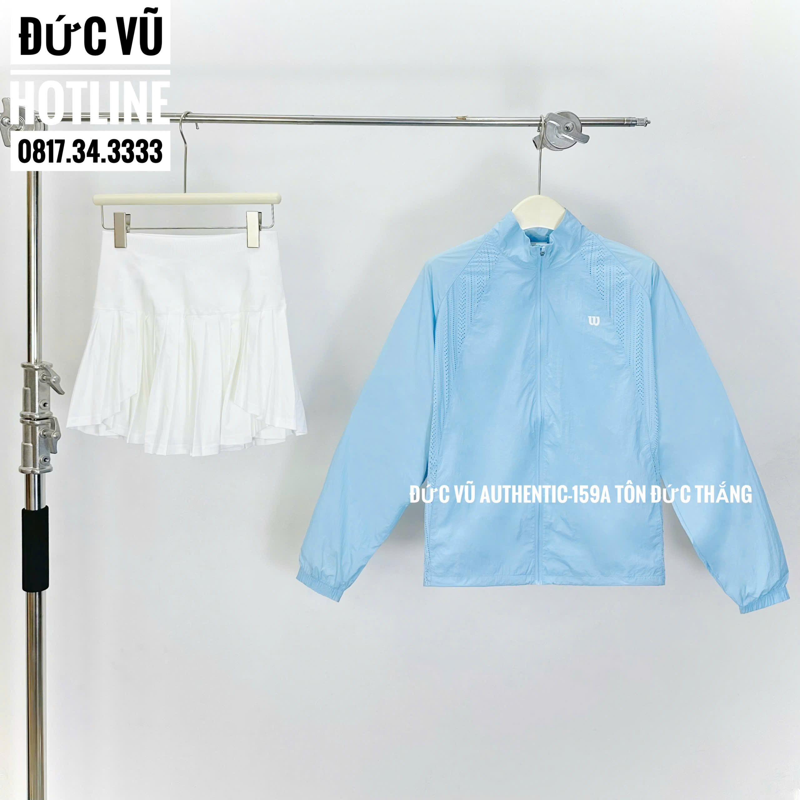 Set thể thao nữ Wilson – Áo khoác xanh pastel và chân váy tennis trắng