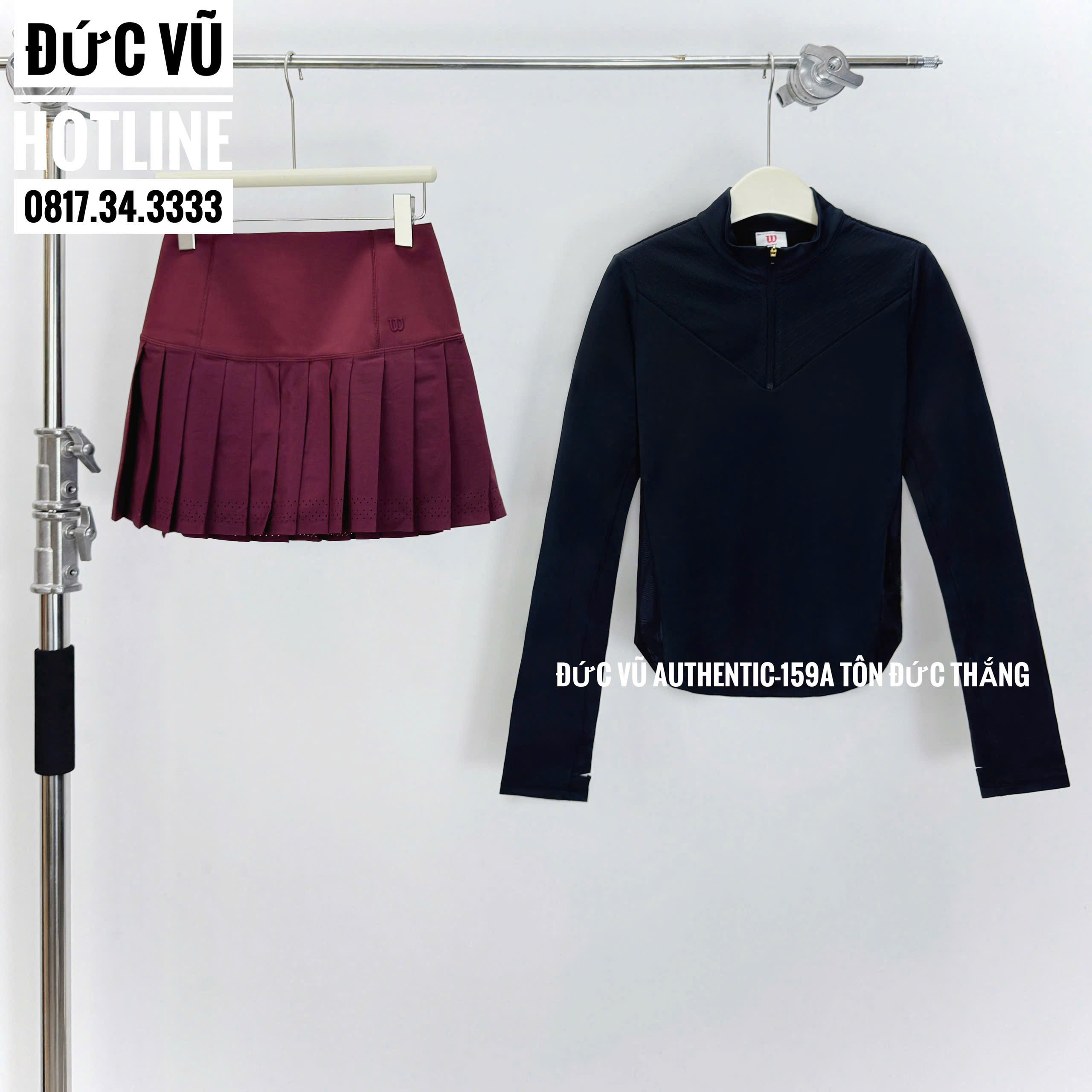 Bộ outfit thể thao nữ Wilson – Áo dài tay đen khóa kéo cổ cao và chân váy tennis đỏ